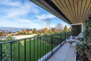 Turnkey Contemporary Home with Lake Views